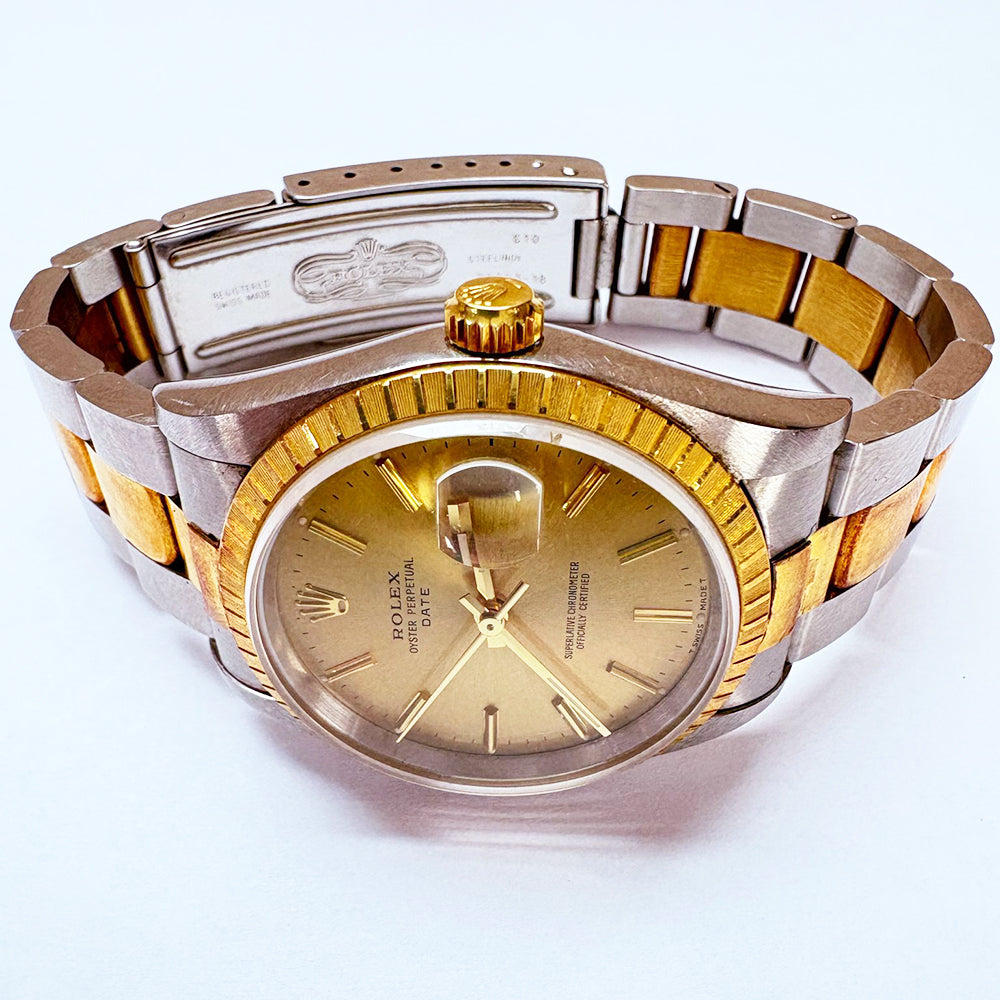 Rolex Oyster Perpetual Date Champagne Dial 15223 (1995)