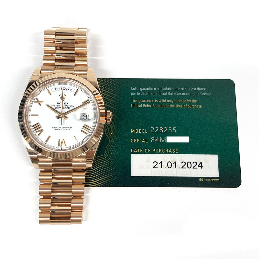 Rolex Day-Date 40mm White Roman Dial 228235