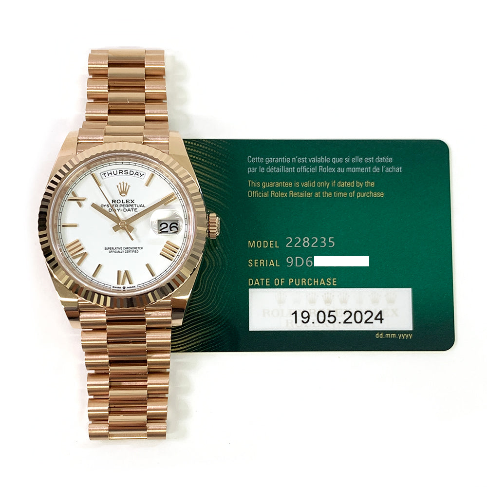 Rolex Day-Date 40mm White Roman Dial 228235