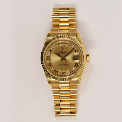 Rolex Day-Date 36mm Champagne Myriad Roman Dial 118238MR (2011)